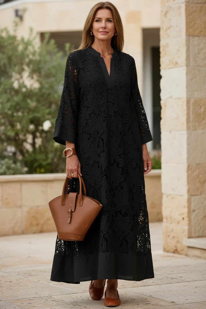 Onyx black lace midi dress with V-neck, three-quarter sleeves, and textured lace design
