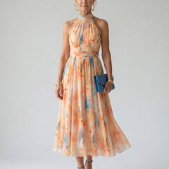 Watercolor orange-and-blue halter midi dress, gathered bodice, flowing full skirt