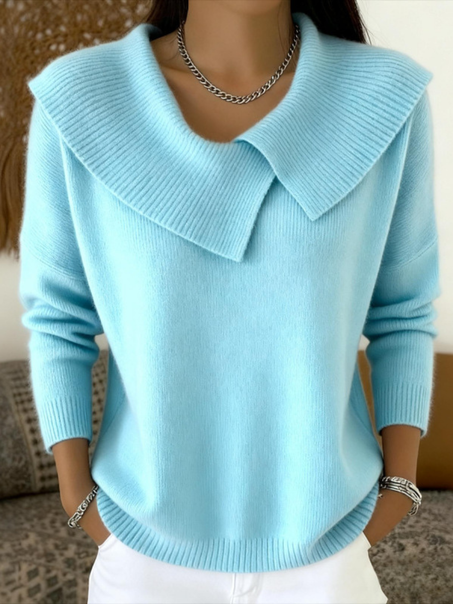Light blue knit jumper with soft, wide collar and long sleeves