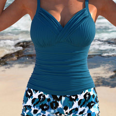 Ribbed peacock blue tankini with V-neck and printed animal-pattern shorts