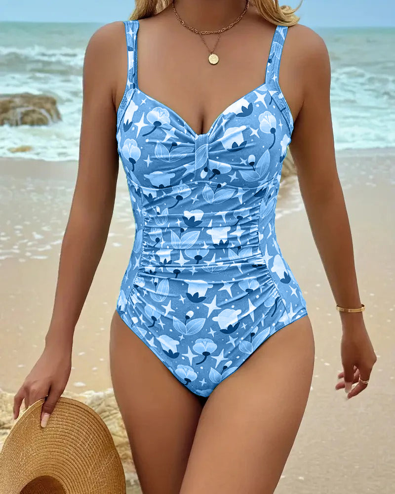Blue printed one-piece tankini swimsuit with ruched front and bow-tie at bust