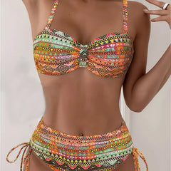 Printed bikini set with underwire cups, center bow, and tie-side high-cut bottoms in orange mix.