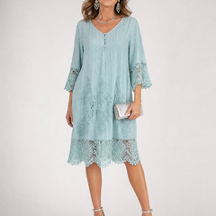 Light blue shift midi dress with V-neck and embroidered lace hem trim