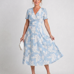 Light blue floral V-neck midi dress with short sleeves and gathered waist