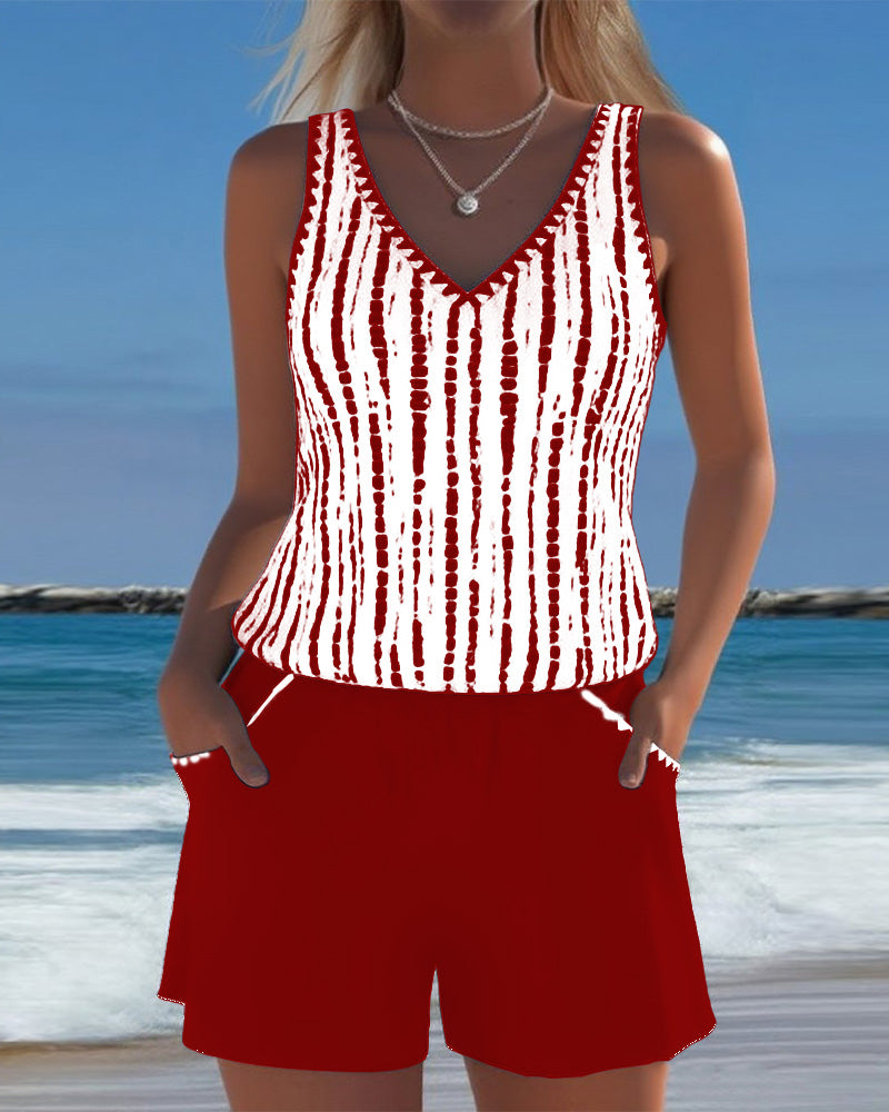 Red two-piece V-neck swimsuit set with white vertical tie-dye stripe top and shorts