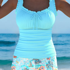 Cyan tankini set with ruched scoop-neck top, ruffle straps, floral skirt