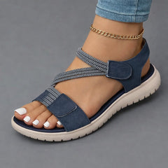 Blue open-toe sandals with two hook-and-loop straps, ankle chain, cushioned sole