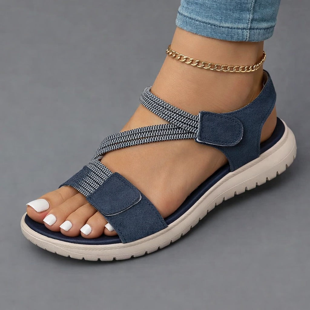 Blue open-toe sandals with two hook-and-loop straps, ankle chain, cushioned sole