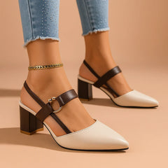 White heeled slingbacks with ring buckle and black ankle strap