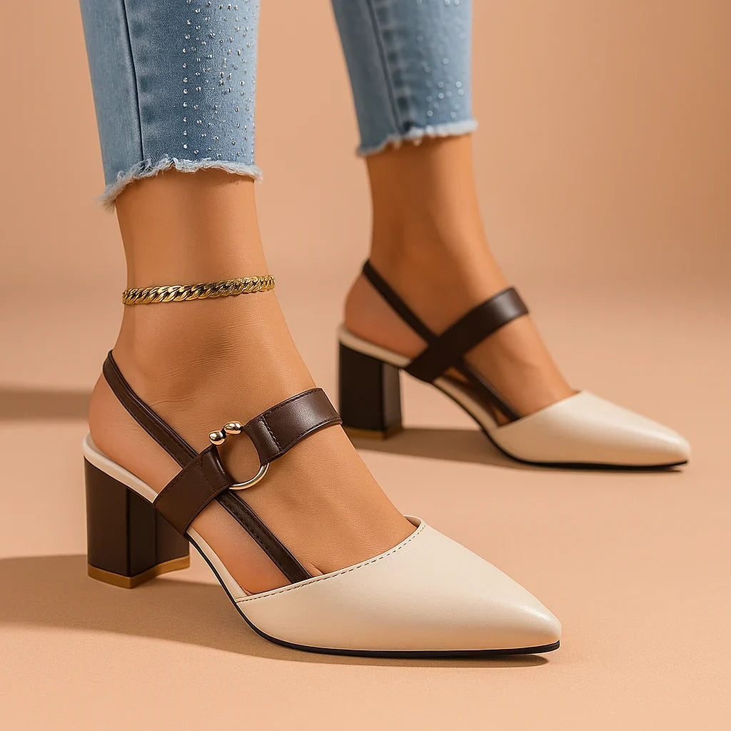 White heeled slingbacks with ring buckle and black ankle strap