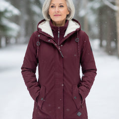 Burgundy sherpa-lined parka with adjustable hood, zip front, and snap button chest pockets
