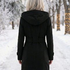 Back view of black wool belted coat with hood and buttoned cuffs