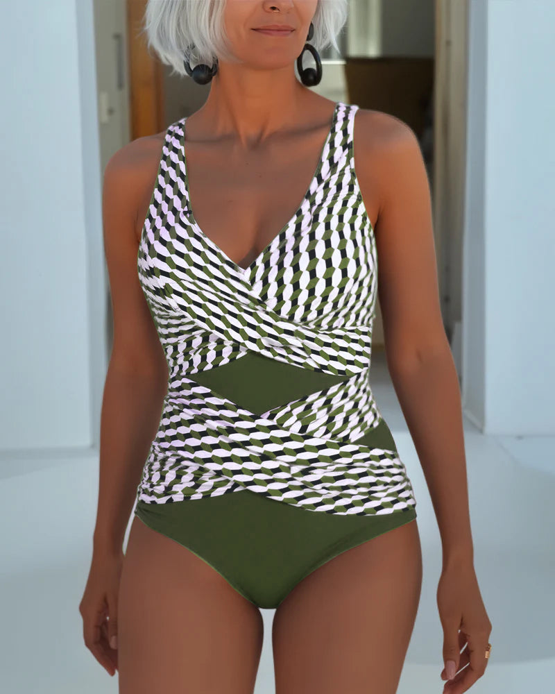 Women's cross-over swimsuit, white with dark geometric print and green bottom