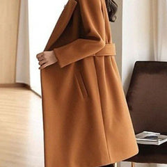 Cognac brown overcoat with notched lapels and belt at the waist