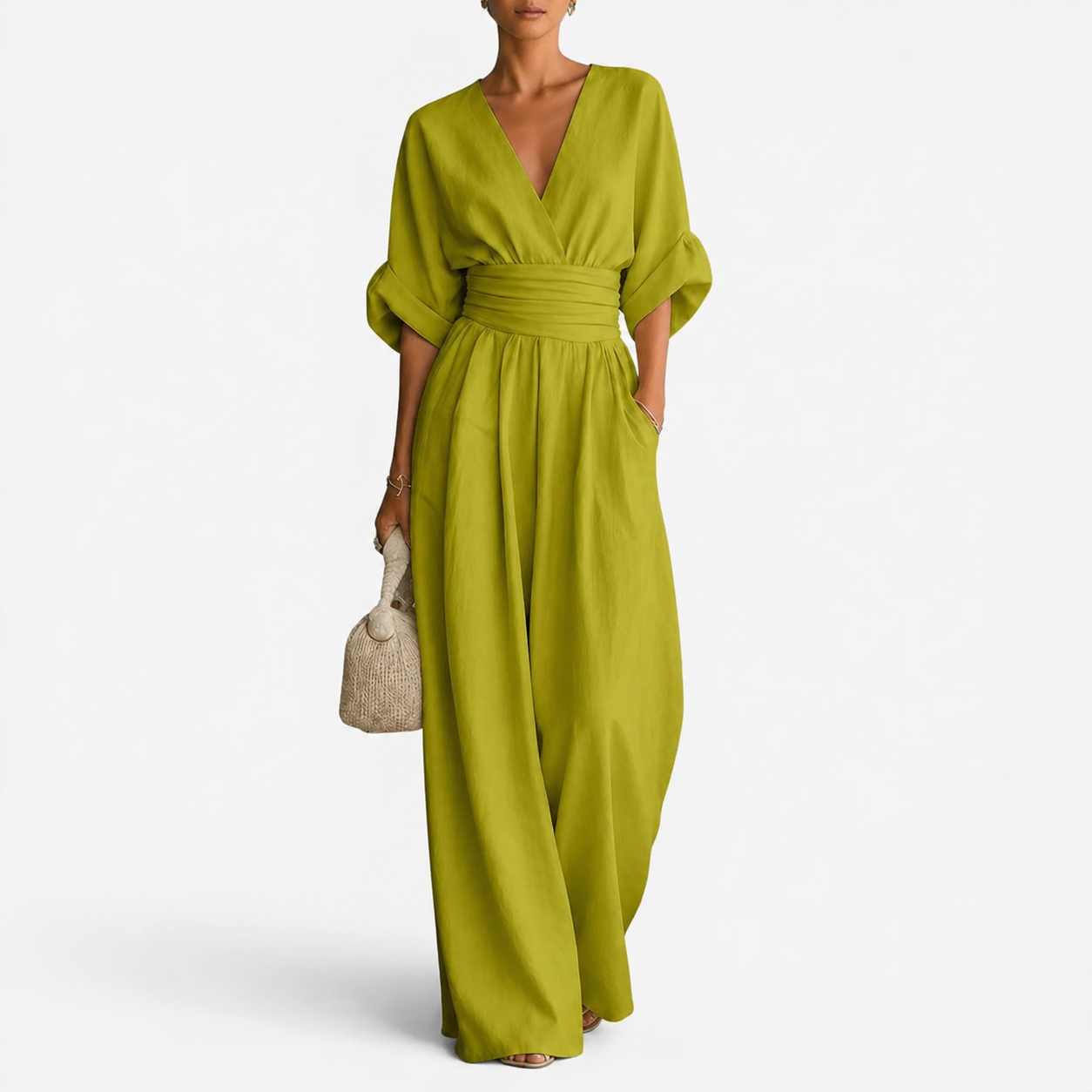 Lime green V-neck jumpsuit with gathered waist and wide-leg drape.