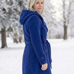 Blue wool hooded coat with belt tie and button details along the front.