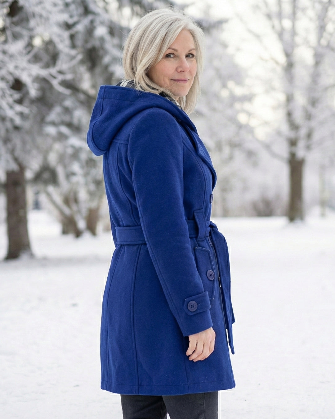 Blue wool hooded coat with belt tie and button details along the front.