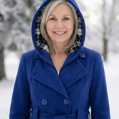 Blue wool hooded coat with plaid hood lining and double-button lapels.