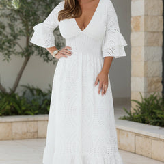 Waist-sculpting white maxi dress with V-neck, flutter sleeves, and scalloped eyelet hem