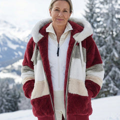 Colorblock plush hooded jacket with zip, burgundy, cream, and gray stripe blocks.