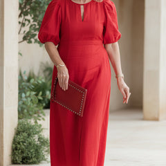 Rose red maxi dress with puff sleeves and keyhole neckline, gathered waist.