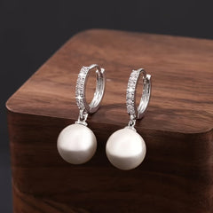 Geometric pearl drop earrings with silver pavé hoops