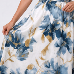 Floral wrap midi skirt detail with blue floral and gold leaves, gathered waist