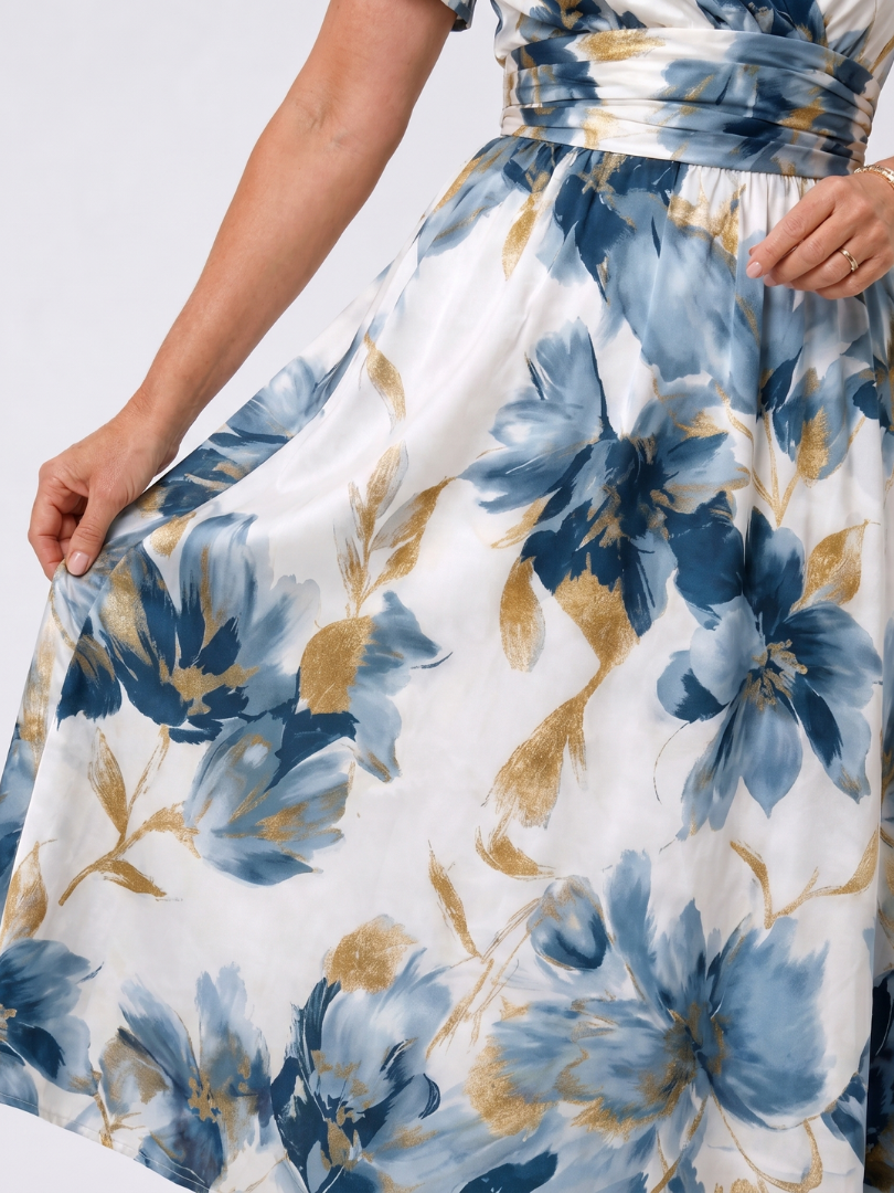 Floral wrap midi skirt detail with blue floral and gold leaves, gathered waist