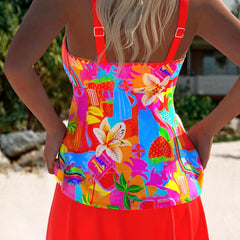 Floral tankini swimdress back view with multicolor print and coral skirt overlay