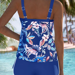 Royal blue tropical floral tankini from back with adjustable straps and white trim