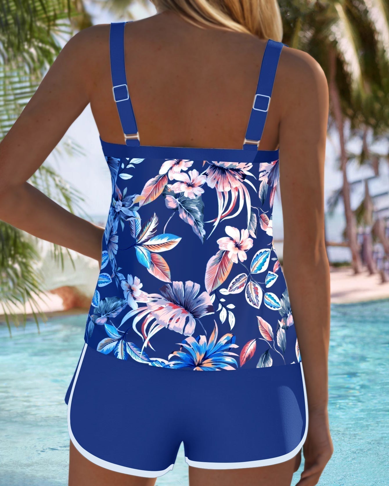 Royal blue tropical floral tankini from back with adjustable straps and white trim