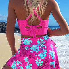 Neon pink-red swim skirt with turquoise and magenta floral print, flared hem