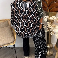 Navy long-sleeve blouse with white oval linked pattern, front profile