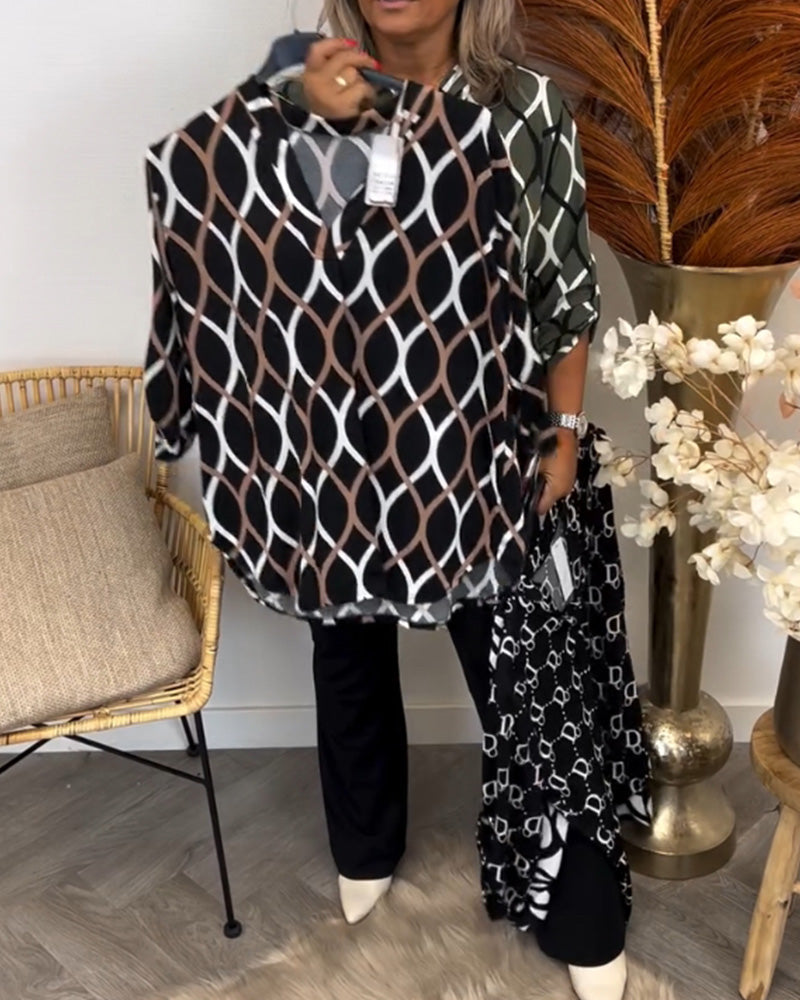 Navy long-sleeve blouse with white oval linked pattern, front profile