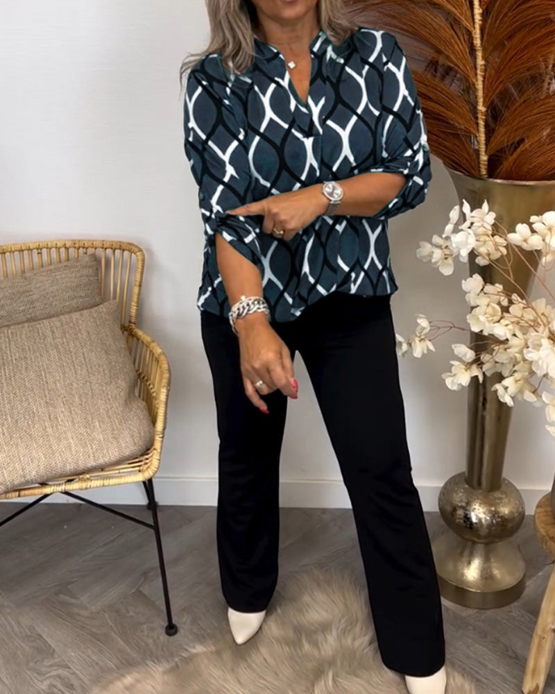 Navy casual long-sleeve blouse with white linked oval print, front view