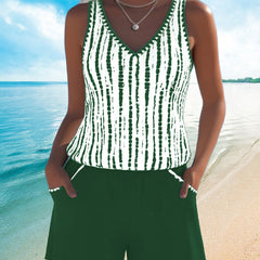 Green two-piece V-neck swimsuit set with white vertical tie-dye stripe tank and shorts