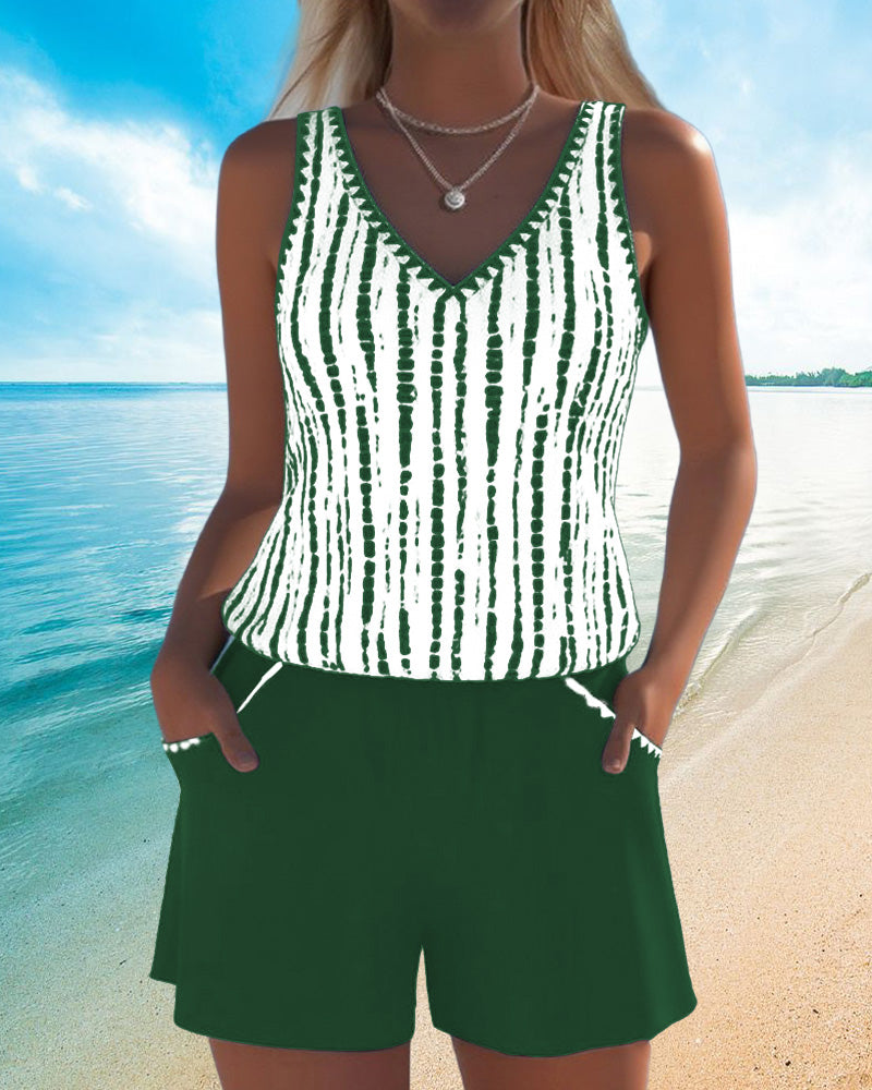 Green two-piece V-neck swimsuit set with white vertical tie-dye stripe tank and shorts