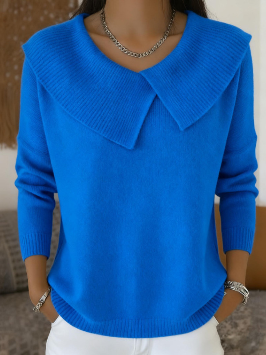 Blue knit warm jumper with soft pointed collar and V-neck