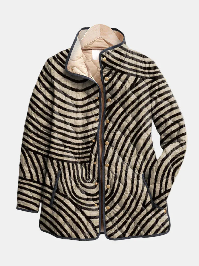 Black and cream zebra-striped quilted jacket with button front and stand collar