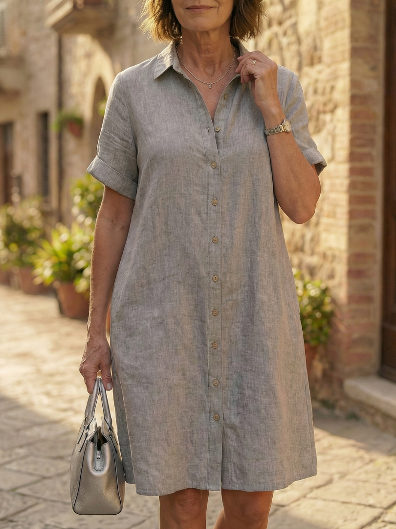 Gray linen-look courtyard walk dress with button front, short sleeves, and front pocket detailing