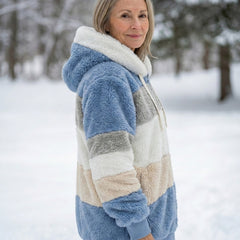 Colorblock plush zip-up hoodie jacket, side view in blue, gray, and cream color blocks