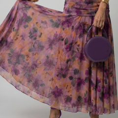 Off-shoulder maxi dress with purple and orange floral print, flowing chiffon skirt