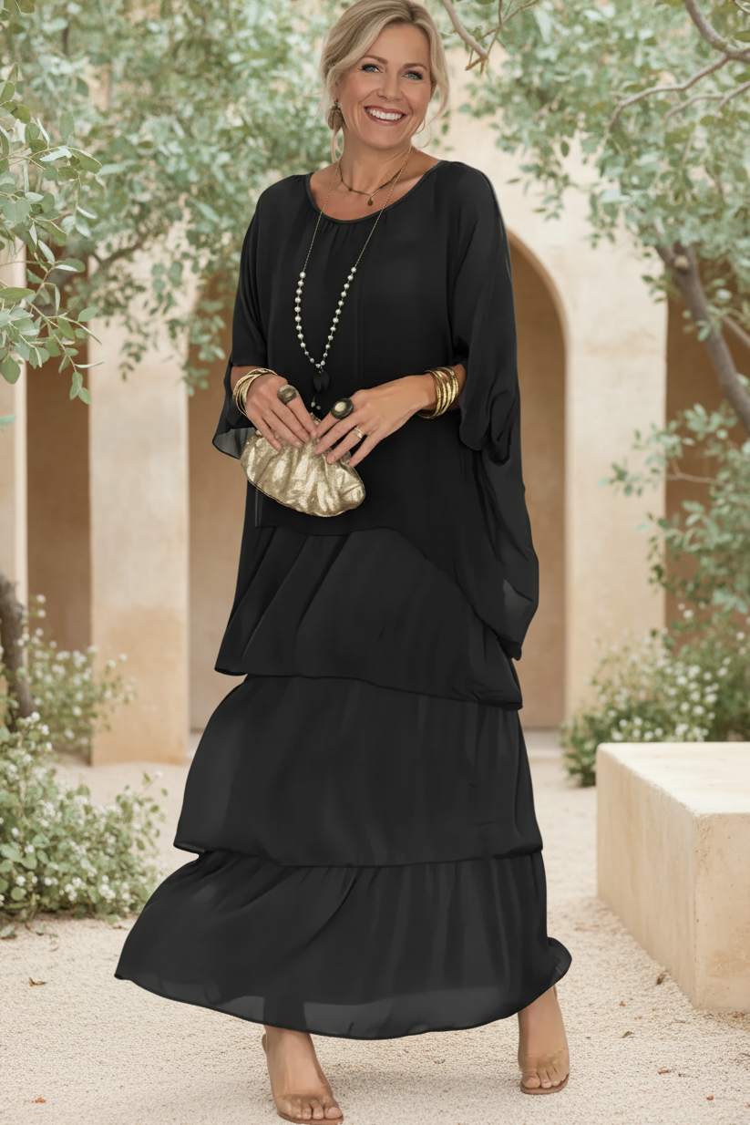 Carbon black tiered long-sleeve dress with draped overlay and round neckline