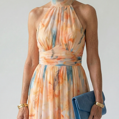 Watercolor orange-and-blue halter midi dress with gathered waist and sleeveless bodice