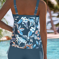 Royal blue tropical floral tankini back view with adjustable straps and white trim
