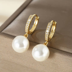 Gold geometric pearl drop earrings with pavé hoops