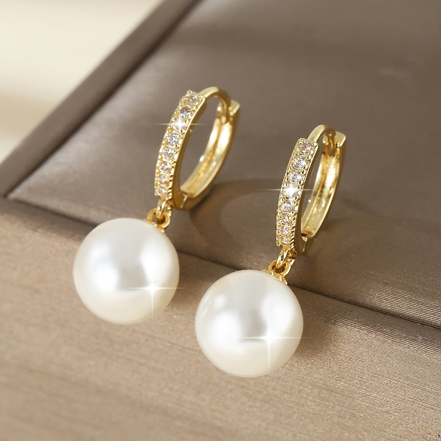 Gold geometric pearl drop earrings with pavé hoops