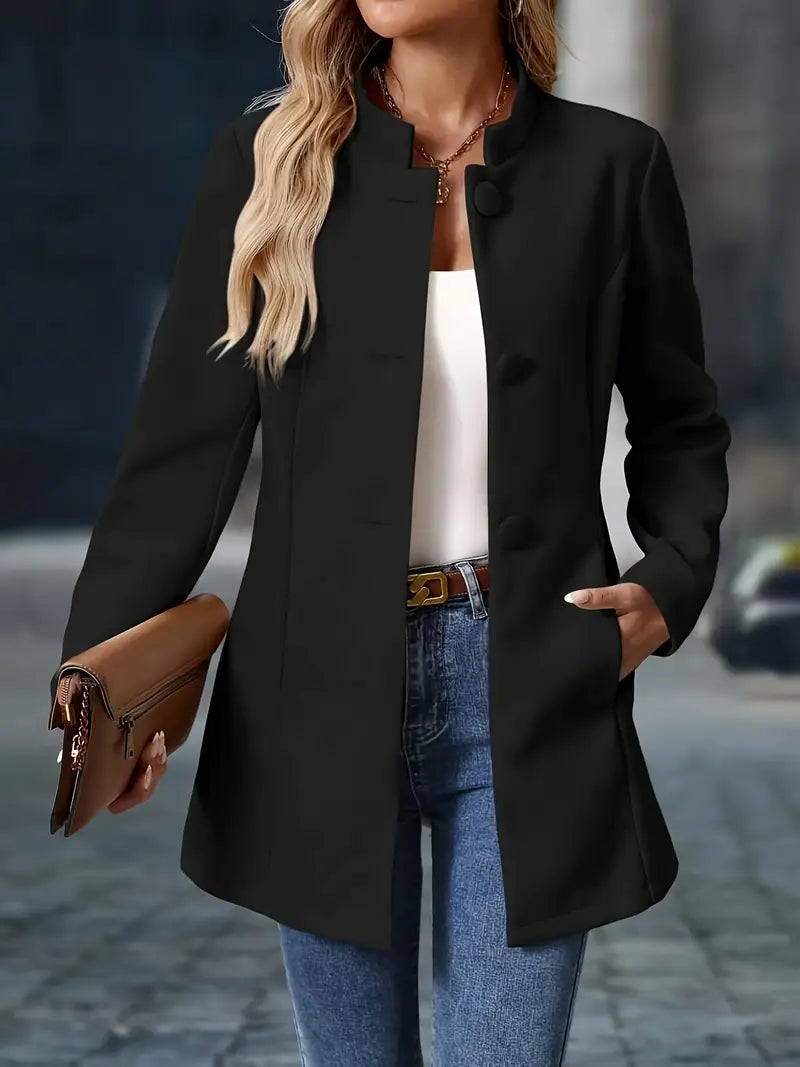 Black button-up tailored coat with notch lapels, rounded buttons, and side pockets