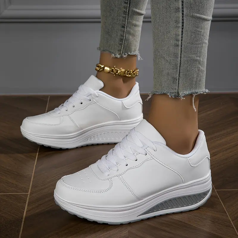 White lace-up platform comfort sneakers with thick sole and rounded toe