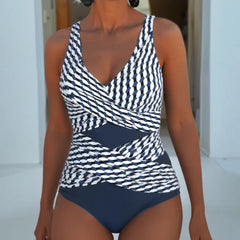 Women's cross-over swimsuit, white with dark geometric print and navy bottom